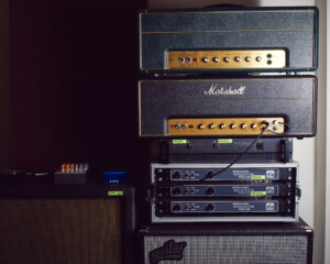 Image shows a variety of amp cabs and heads.