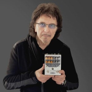 Tony Iommi holding a RevivalDrive