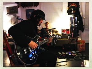 Jack White (left) and Joshua Homme (back right)